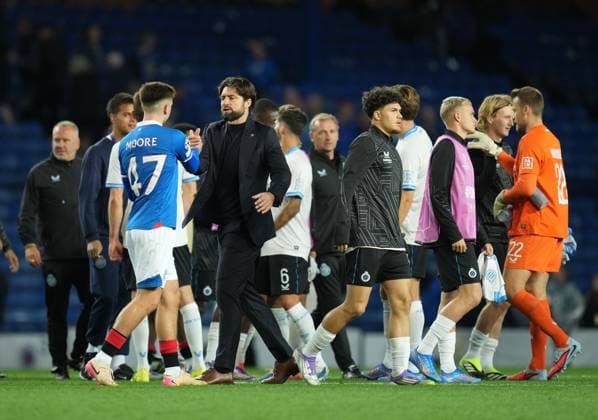 Mikey Moore of Rangers shakes hands with Rangers Manager Russell Martin on the pitch at full-time. Final score Rangers 1 Club Brugge 3. Rangers v Club Brugge, UEFA Champions League, Play-Off Round, First Leg, Football, Ibrox Stadium, Glasgow, Scotland, UK - 19 Aug 2025Glasgow Ibrox Stadium Scotland United Kingdom EDITORIAL USE ONLY No use with unauthorised audio, video, data, fixture lists, club league logos or live services. Online in-match use limited to 120 images, no video emulation. No use in betting, games or single club league player publications. Copyright: xStuartxWallace Shutterstockx 15446679eg