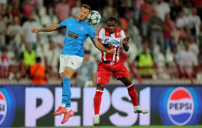 (250820) -- BELGRADE, Aug. 20, 2025 -- Felicio Milson (R) of Crvena Zvezda vies with Mislav Orsic of Pafos during the UEFA Champions League play-offs 1st leg football match between Crvena Zvezda and Pafos in Belgrade, Serbia, on Aug. 19, 2025. (Photo by Xinhua) (SP)SERBIA-BELGRADE-FOOTBALL-UEFA CHAMPIONS LEAGUE-PLAY-OFFS-CRVENA ZVEZDA VS PAFOS PredragxMilosavljevic 