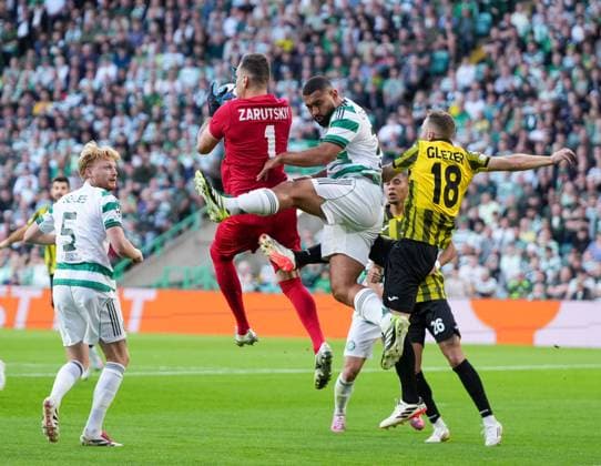 Kairat Almaty goalkeeper Alexandr Zarutskiy catches the ball under pressure from Cameron Carter-Vickers of Celtic. Celtic v Kairat Almaty, UEFA Champions League, Play-Off Round, First Leg, Football, Celtic Park, Glasgow, Scotland, UK - 20 Aug 2025Glasgow Celtic Park Scotland United Kingdom EDITORIAL USE ONLY No use with unauthorised audio, video, data, fixture lists, club league logos or live services. Online in-match use limited to 120 images, no video emulation. No use in betting, games or single club league player publications. Copyright: xStuartxWallace Shutterstockx 15446684x