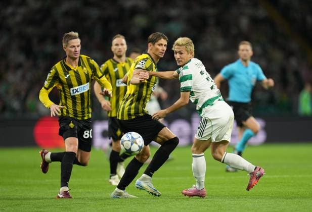 Kairat Almaty captain Aleksandr Martynovich & Daizen Maeda of Celtic Celtic v Kairat Almaty, UEFA Champions League, Play-Off Round, First Leg, Football, Celtic Park, Glasgow, Scotland, UK - 20 Aug 2025Glasgow Celtic Park Scotland United Kingdom EDITORIAL USE ONLY No use with unauthorised audio, video, data, fixture lists, club league logos or live services. Online in-match use limited to 120 images, no video emulation. No use in betting, games or single club league player publications. Copyright: xStuartxWallace Shutterstockx 15446684dk