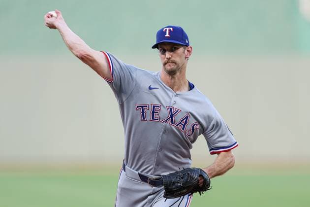 August 20, 2025: Texas Rangers starting pitcher Caleb Boushley (70) warms up before the bottom of the first inning of a baseball game against the Kansas City Royals at Kauffman Stadium in Kansas City, MO. CSM Kansas City United States of America - ZUMAc04_ 20250820_zma_c04_012 Copyright: xDavidxSmithx