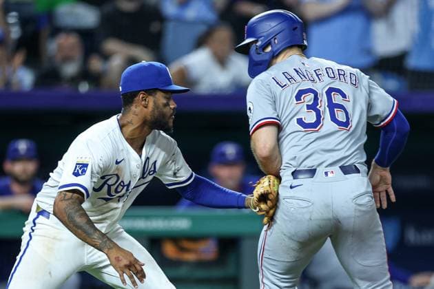August 20, 2025: Kansas City Royals third baseman Maikel Garcia (11) tags out Texas Rangers left fielder Wyatt Langford (36) on a run down during the seventh inning of a baseball game at Kauffman Stadium in Kansas City, MO. CSM Kansas City United States of America - ZUMAc04_ 20250820_zma_c04_071 Copyright: xDavidxSmithx