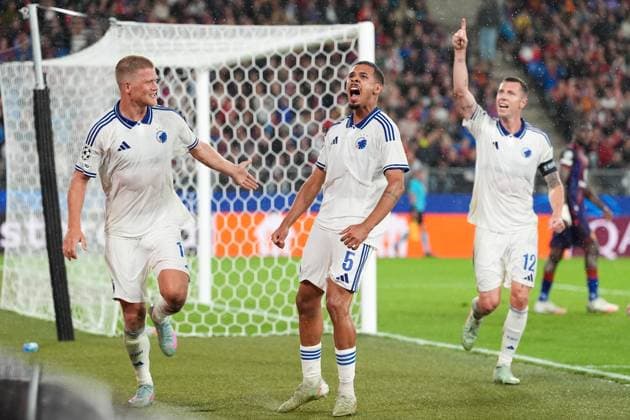 Andreas Cornelius (FC Copenhagen, 14), Gabriel Pereira (FC Copenhagen, 5), and Lukas Lerager (FC Copenhagen, 12) celebrate after a goal during FC Basel 1893 vs FC Copenhagen, UEFA Champions League football match in Basel, Switzerland, August 20 2025  Copyright: xScottxColeman IPAxSportx xipa-agency.netx xx IPA_62826875 IPA_Agency_IPA62826875
