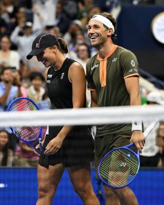 Iga Swiatek and Casper Ruud react after defeating Jessica Pegula and Jack Draper during the Mixed Doubles Semi Finals on Arthur Ashe Stadium at the 2025 US Open Tennis Championship at the USTA Billie Jean King National Tennis Center in New York City on Wednesday, August 20, 2025 in New York City. Jessica Pegula and Jack Draper were defeated by Iga Swiatek and Casper Ruud 5-3-3-5 8-10 and advance to the finals.  NYP20250820502 LarryxMarano