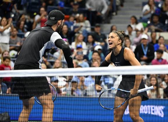 Sara Errani and Andrea Vavassori react after defeating Danielle Collins and Christian Harrison during the Mixed Doubles Semi Finals on Arthur Ashe Stadium at the 2025 US Open Tennis Championship at the USTA Billie Jean King National Tennis Center in New York City on Wednesday, August 20, 2025 in New York City. Sara Errani and Andrea Vavassori react after defeating Danielle Collins and Christian Harrison 4-2-4-2 and advance to the finals.  NYP20250820516 LarryxMarano