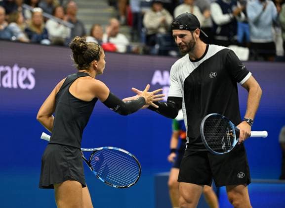 Sara Errani and Andrea Vavassori Vs Danielle Collins and Christian Harrison during the Mixed Doubles Semi Finals on Arthur Ashe Stadium at the 2025 US Open Tennis Championship at the USTA Billie Jean King National Tennis Center in New York City on Wednesday, August 20, 2025 in New York City. Sara Errani and Andrea Vavassori react after defeating Danielle Collins and Christian Harrison 4-2-4-2 and advance to the finals.  NYP20250820518 LarryxMarano