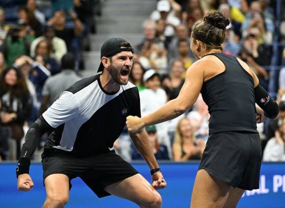 Sara Errani and Andrea Vavassori react during match point after defeating Iga Swiatek and Casper Ruud during the Mixed Doubles Final on Arthur Ashe Stadium at the 2025 US Open Tennis Championship at the USTA Billie Jean King National Tennis Center in New York City on Wednesday, August 20, 2025 in New York City.  NYP20250820526 LarryxMarano