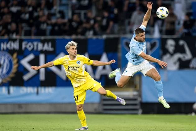 250821 Stepan Langer of SK Sigma Olomouc and Gabriel Busanello of Malmö FF during the first leg UEFA Europa League playoff football match between Malmö FF and SK Sigma Olomouc on August 21, 2025 in Malmö. Photo: Petter Arvidson BILDBYRAN kod PA PA1067 fotboll football soccer fotball uefa europa league europa league malmö ff sk sigma olomouc bbeng playoff bbauto Copyright: PETTERxARVIDSON BB250821PA090