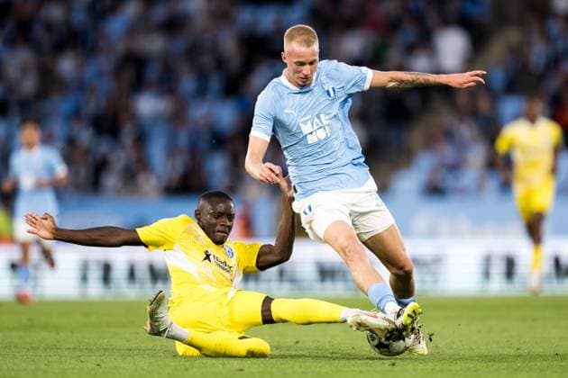 250821 Abdoulaye Sylla of SK Sigma Olomouc and Daniel Gudjohnsen of Malmö FF during the first leg UEFA Europa League playoff football match between Malmö FF and SK Sigma Olomouc on August 21, 2025 in Malmö. Photo: Petter Arvidson BILDBYRAN kod PA PA1067 fotboll football soccer fotball uefa europa league europa league malmö ff sk sigma olomouc bbeng playoff bbauto Copyright: PETTERxARVIDSON BB250821PA099