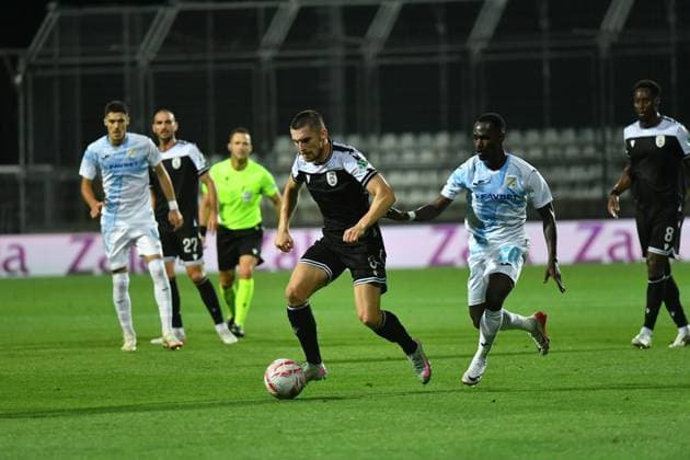 Rijeka, 210825. Rujevica Stadium. Players Jonjoe Kenny and Merveil Ndockyt play on the first match of the 4th qualifying round of the UEFA Europa League Rijeka - PAOK. Photo: Damir Skomrlj CROPIX Copyright: xxDamirxSkomrljx xCROPIXx rijeka_paok15-210825