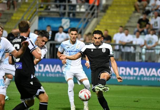 Rijeka, 210825. Rujevica Stadium. Players Ioannis Michailidis and NikoJankovic play on the first match of the 4th qualifying round of the UEFA Europa League Rijeka - PAOK. Photo: Damir Skomrlj CROPIX Copyright: xxDamirxSkomrljx xCROPIXx rijeka_paok24-210825