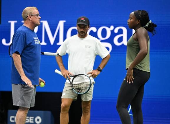 FLUSHING NY- AUGUST 21: Coco Gauff is seen on the practice court with her coach Jean-Christophe Faurel and Gavin MacMillan on Arthur Ashe Stadium at the USTA Billie Jean King National Tennis Center on August 21, 2025 in Flushing Queens. Copyright: xmpi04x