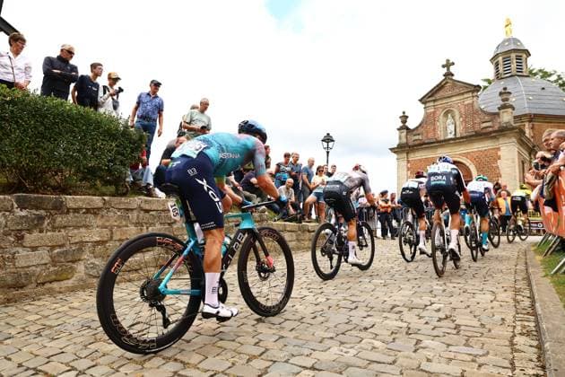 The pack of riders pictured on the Muur of Geraardsbergen during the third stage of the Renewi Tour multi-stage cycling race, from Aalter to Geraardsbergen (179,9 km) on Friday 22 August 2025. The five-day race takes place in Belgium and the Netherlands. DAVIDxPINTENS  x131891139x