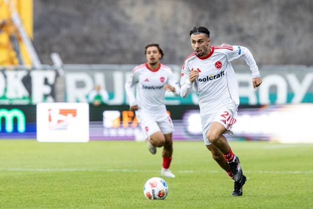2. Fußball Bundesliga: SC Preußen Münster - 1.FC Nürnberg; 22.08.2025 Berkay Yilmaz (1.FC Nürnberg, 21) 2. Fußball Bundesliga: SC Preußen Münster - 1.FC Nürnberg; LVM Preußenstadion, Münster; 22.08.2025 DFL regulations prohibit any use of photographs as image sequences and or quasi video.