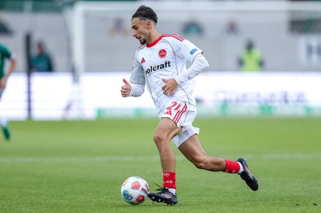 22.08.2025, Fußball, Preußen Münster - 1. FC Nürnberg, 2. Fußball Bundesliga, Preußenstadion, Saison 2025 2026: Berkay Yilmaz (1FC Nuernberg 21) DFB regulations prohibit any use of photographs as image sequences and or quasi-video. Nordrhein-Westfalen Deutschland