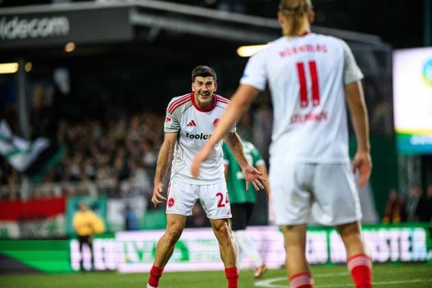 MUNSTER, GERMANY - 22 AUGUST, 2025: Luka Lochoshvili, Artem Stepanov, The football match of 2.Bundesliga SC Preussen Munster 1. FC Nurnberg at LVM-Preussenstadion  Copyright: xVITALIIxKLIUIEVx