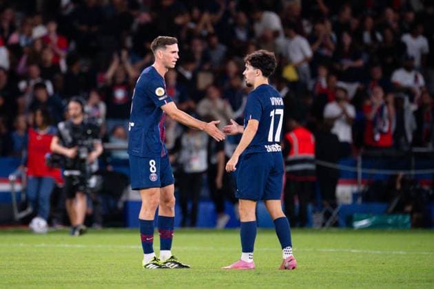 FOOTBALL : PSG vs Angers - Ligue1 - 22 08 2025 Fabian Ruiz ( 8 - PSG ) shake hands with Vitinha Vitor Machado ( 17 - PSG ) following the Ligue 1 match between Paris Saint Germain and Angers SCO at Parc Des Princes on August 22 , 2025 in Paris, France. ( Photo by Federico Pestellini PsnewZ ) - ParisFrance  Copyright: xx