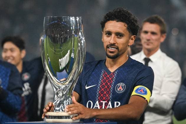 PSG trophies presentation in Paris - FA Paris Saint-Germain’s defender Marquinhos presents the Super Cup 2025 as Paris Saint-Germain’s players celebrate the Super Cup 2025 and their 2024-2025 season’s trophies after the French L1 football match between Paris Saint-Germain and Angers SCO at the Parc des Princes stadium in Paris on August 22, 2025. Photo by Firas Abdullah ABACAPRESS.COM Paris Île-de-France France  Copyright: xAbdullahxFiras ABACAx
