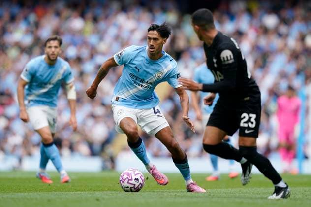 Manchester, England, 23rd August 2025. Tijjani Reijnders of Manchester City (C) during the Manchester City vs Tottenham Hotspur Premier League match at the Etihad Stadium, Manchester. Picture credit should read: Andrew Yates Sportimage EDITORIAL USE ONLY. No use with unauthorised audio, video, data, fixture lists, club league logos or live services. Online in-match use limited to 120 images, no video emulation. No use in betting, games or single club league player publications. SPI_014_AY_MAN_CITY_SPURS SPI-4081-0014