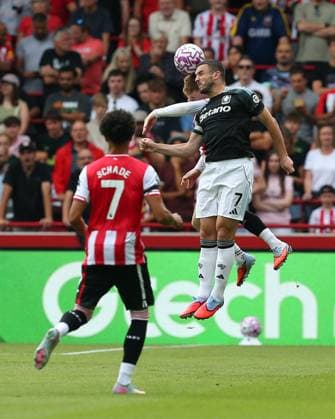 London, England, August 23 2025: Keane Lewis-Potter (23 Brentford) and John McGinn (7 Aston Villa) jump to win a header during the Premier League game between Brentford and Aston Villa at Gtech Community Stadium in London, England. (Photo by Jay Patel Sports Press Photo SPP) Copyright: xx Sportspressphoto_SPR13761
