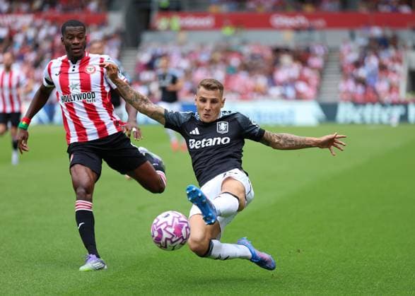 23rd August 2025; Gtech Community Stadium, Brentford, London, England; Premier League Football, Brentford versus Aston Villa; Lucas Digne of Aston Villa attempting to keep the ball in play under pressure  JohnxPatrickxFletcher