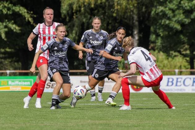 24.08.2025, xgrfx, Fussball Testspiel , SC Freiburg Frauen - Eintracht Frankfurt Frauen v.l. Jarne Teulings (Eintracht Frankfurt), Meret Felde (SC Freiburg) (DFL DFB REGULATIONS PROHIBIT ANY USE OF PHOTOGRAPHS as IMAGE SEQUENCES and or QUASI-VIDEO) Freiburg