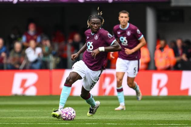 Burnley, England, 23rd August 2025. Lesley Ugochukwu of Burnley makes a break with the ball during the Burnley vs Sunderland Premier League match at Turf Moor, Burnley. Picture credit should read: Craig Thomas Sportimage EDITORIAL USE ONLY. No use with unauthorised audio, video, data, fixture lists, club league logos or live services. Online in-match use limited to 120 images, no video emulation. No use in betting, games or single club league player publications. SPI_040_CT_Burnley_v_Sunderland SPI-4083-0040