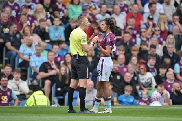 23rd August 2025; Turf Moor, Burnley, Lancashire, England; Premier League Football, Burnley versus Sunderland; the match referee speaks to Hannibal Mejbri of Burnley after a late tackle  LeexDurkin