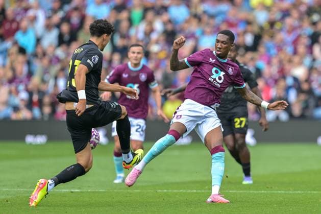 23rd August 2025; Turf Moor, Burnley, Lancashire, England; Premier League Football, Burnley versus Sunderland; Jenson Seelt of Sunderland takes the ball from Jaidon Anthony of Burnley  LeexDurkin