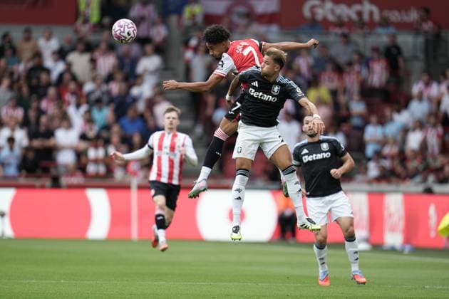 Premier League Brentford v Aston Villa Kevin Schade of Brentford and Matty Cash of Aston Villa battle for header during the Premier League match Brentford vs Aston Villa at The Gtech Community Stadium, London, United Kingdom, 23rd August 2025 (Photo by Harvey Murphy News Images) Copyright: xHarveyxMurphy NewsxImagesx