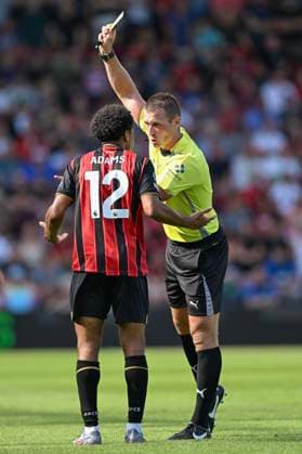Bournemouth v Wolverhampton Wanderers Premier League Tyler Adams of Bournemouth is shown a yellow card by Referee Tom Bramall during the Premier League match at the Vitality Stadium, Bournemouth UK Newspapers OUT Copyright: xJeremyxLandeyx FIL-22134-0039