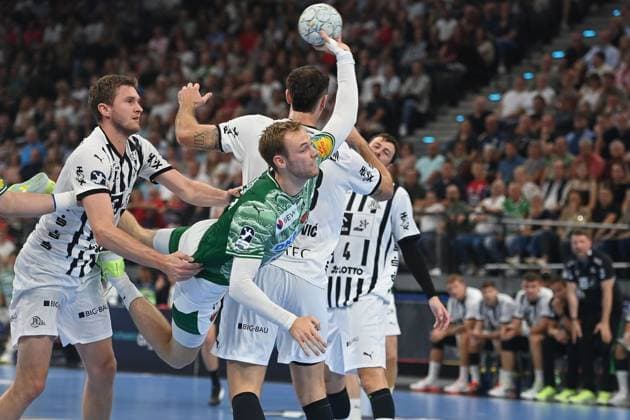 Mathias GIDSEL (Fuechse Berlin), Aktion,Wurf gegen Magnus Landin JACOBSEN (Kiel) Handball Super Cup 2025 der Maenner Fuechse Berlin vs. THW Kiel am 23.08.2025, SAP GARDEN Muenchen.