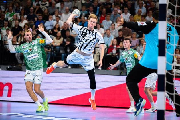 Muenchen: HBL Super Cup 2025 - Fuechse Berlin - THW Kiel Eric Johansson (THW Kiel), Torhueter Dejan Milosavljev (Berlin) Muenchen SAP Garden Bayern Deutschland