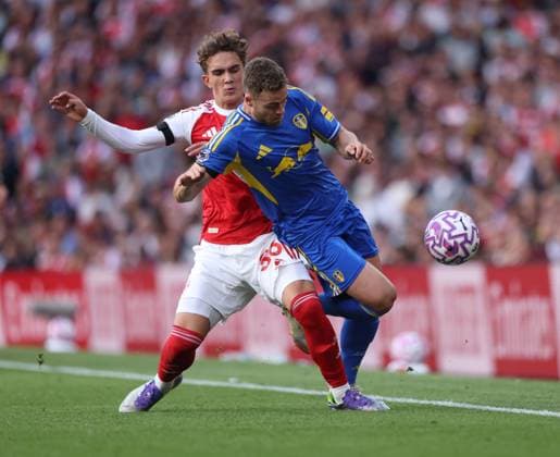 Gabriel Gudmundsson (LU) Max Robert Dowman (A) at the Arsenal v Leeds United EPL match, at the Emirates Stadium, London, UK on 23rd August, 2025. 