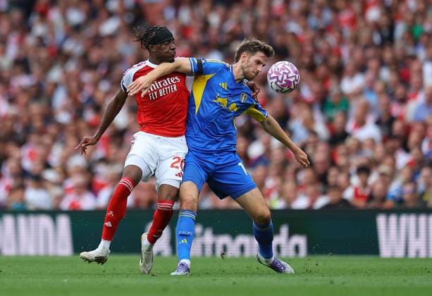 Noni Madueke of Arsenal and Anton Stach of Leeds United Arsenal v Leeds United, Premier League, Football, Emirates Stadium, London, UK - 23 Aug 2025London Emirates Stadium United Kingdom EDITORIAL USE ONLY No use with unauthorised audio, video, data, fixture lists, club league logos or live services. Online in-match use limited to 120 images, no video emulation. No use in betting, games or single club league player publications. Copyright: xMichaelxZemanek Shutterstockx 15451837bu