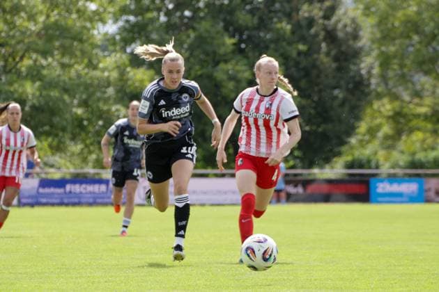 24.08.2025, xgrfx, Fussball Testspiel , SC Freiburg Frauen - Eintracht Frankfurt Frauen v.l. Laura Freigang (Eintracht Frankfurt), Meret Felde (SC Freiburg) (DFL DFB REGULATIONS PROHIBIT ANY USE OF PHOTOGRAPHS as IMAGE SEQUENCES and or QUASI-VIDEO) Freiburg