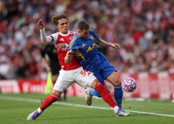 London, England, 23rd August 2025. Max Dowman of Arsenal with Gabriel Gudmundsson of Leeds United during the Arsenal vs Leeds United Premier League match at the Emirates Stadium, London. Picture credit should read: David Klein Sportimage EDITORIAL USE ONLY. No use with unauthorised audio, video, data, fixture lists, club league logos or live services. Online in-match use limited to 120 images, no video emulation. No use in betting, games or single club league player publications. SPI_022_DK_Arsenal_Leeds SPI-4090-0022