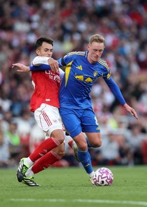 London, England, 23rd August 2025. Martin Zubimendi of Arsenal with Sean Longstaff of Leeds United during the Arsenal vs Leeds United Premier League match at the Emirates Stadium, London. Picture credit should read: David Klein Sportimage EDITORIAL USE ONLY. No use with unauthorised audio, video, data, fixture lists, club league logos or live services. Online in-match use limited to 120 images, no video emulation. No use in betting, games or single club league player publications. SPI_036_DK_Arsenal_Leeds SPI-4090-0036