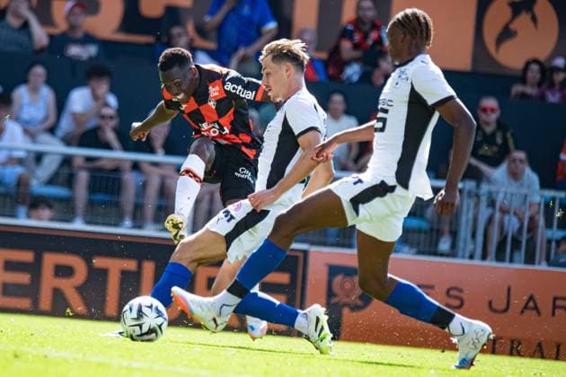 FOOTBALL : FC Lorient vs Stade Rennais - Ligue 1 - JournÃ e 2 - 24 08 2025 Aiyegun Tosin (FC Lorient) Anthony Rouault (Stade Rennais) LorientFrance  Copyright: xBaptistexAutissierx