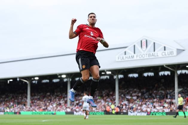 24th August 2025; Craven Cottage, Fulham, London, England; Premier League Football, Fulham versus Manchester United, ManU Diogo Dalot of Manchester United celebrates after Leny Yoro of Manchester United scored his his sides 1st in the 58th to make it 1-0  JohnxPatrickxFletcher