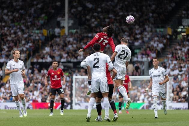 Patrick Dorgu of Manchester United, ManU heads the ball ahead of Timothy Castagne of Fulham during the Premier League match between Fulham and Manchester United at Craven Cottage on August 24, 2025 in London, England. Copyright: xPedroxSoaresx xSPPx Sportspressphoto_SPR15776