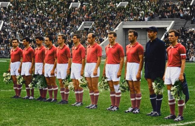 July, 1960. Moscow, USSR. Players of the Soviet Union national football team Valentin Ivanov, Lev Yashin, Vladimir Kesarev, Viktor Ponedelnik, Valentin Bubukin, Anatoly Maslyonkin, Viktor Tsarev, Anatoly Krutikov, Yuri Voinov, Slava Metreveli and Mikhail Meskhi (R-L) stand on the pitch before a match. The exact date of the photograph is unknown. AI-Colourised from original ID 15137153. Valentin Mastyukov TASS  82805571