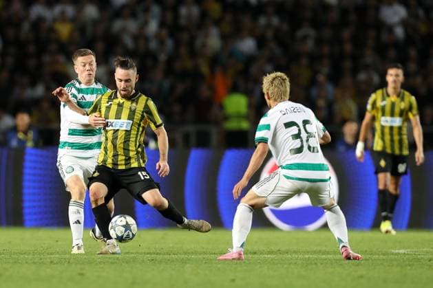 Callum McGregor of Celtic and Ofri Arad of Kairat Almaty Kairat Almaty v Celtic, UEFA Champions League, Play-Off Round, Second Leg, Football, Almaty Central Stadium, Almaty, Kazakhstan - 26 Aug 2025Almaty Almaty Central Stadium Kazakhstan EDITORIAL USE ONLY No use with unauthorised audio, video, data, fixture lists, club league logos or live services. Online in-match use limited to 120 images, no video emulation. No use in betting, games or single club league player publications. Copyright: xNikitaxBassov Shutterstockx 15455823bo
