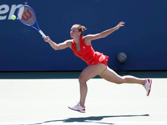 Marta Kostyuk of Ukraine returns a ball to Katie.Boulter of United Kingdom in the second set of their first round match in the Grandstand court on day 3 at the 2025 US Open Tennis Championship at the USTA Billie Jean King National Tennis Center in New York City on Tuesday, August 26, 2025. Kostyuk defeated Boulter in straight sets.  NYP20250826112 JOHNxANGELILLO