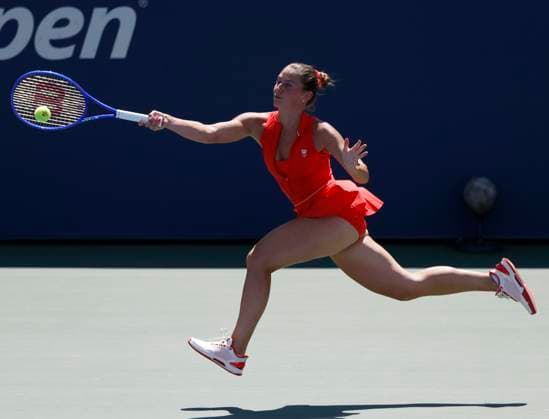 Marta Kostyuk of Ukraine returns a ball to Katie.Boulter of United Kingdom in the second set of their first round match in the Grandstand court on day 3 at the 2025 US Open Tennis Championship at the USTA Billie Jean King National Tennis Center in New York City on Tuesday, August 26, 2025. Kostyuk defeated Boulter in straight sets.  NYP20250826109 JOHNxANGELILLO