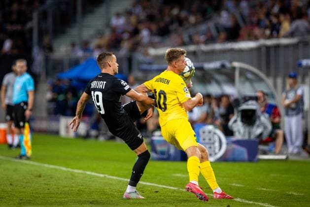 STURM GRAZ vs BODO GLIMT Tomi Horvat of Sturm and Mathias Jorgensen of Bodo during second leg of play off round of UEFA Champions League football match between SK Sturm Graz and FK Bodo Glimt. Worthersee Stadion, Klagenfurt, Austria, August 26, 2025. Photo by Branislav Racko Copyright: xx 080A8176