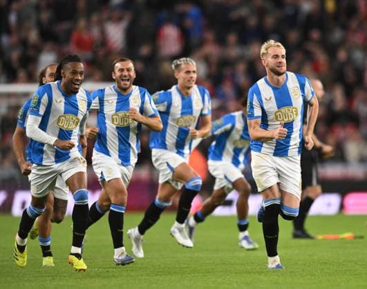 Huddersfield Town celebrate winning the penalty shoot out Sunderland v Huddersfield Town, EFL Carabao Cup, Second Round, Football, Stadium of Light, Sunderland, UK - 26 Aug 2025Sunderland Stadium of Light United Kingdom EDITORIAL USE ONLY No use with unauthorised audio, video, data, fixture lists, club league logos or live services. Online in-match use limited to 120 images, no video emulation. No use in betting, games or single club league player publications.  Copyright: xRichardxLee Shutterstockx 15455838au