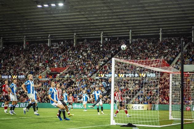 SUNDERLAND, ENGLAND - AUG 26: Lee Nicholls of Huddersfield Town makes save during the Carabao Cup 2024 25 League match between Sunderland and Huddersfield Town at Stadium of Light on August 26th 2025 in Sunderland, England. Copyright: xRichardxCallis SPPx Sportspressphoto_SPR16957