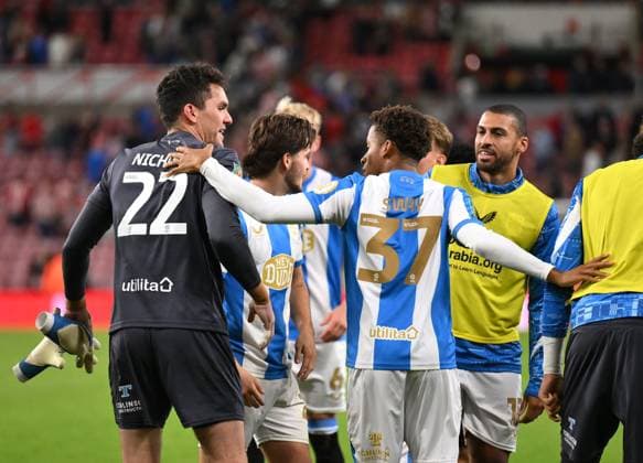 Lee Nicholls of Huddersfield Town (left) celebrates with team mates after beating Sunderland in a penalty shoot out Sunderland v Huddersfield Town, EFL Carabao Cup, Second Round, Football, Stadium of Light, Sunderland, UK - 26 Aug 2025Sunderland Stadium of Light United Kingdom EDITORIAL USE ONLY No use with unauthorised audio, video, data, fixture lists, club league logos or live services. Online in-match use limited to 120 images, no video emulation. No use in betting, games or single club league player publications.  Copyright: xRichardxLee Shutterstockx 15455838bi