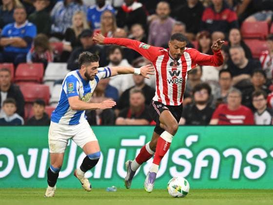 Lynden Gooch of Huddersfield Town (left) and Wilson Isidor of Sunderland Sunderland v Huddersfield Town, EFL Carabao Cup, Second Round, Football, Stadium of Light, Sunderland, UK - 26 Aug 2025Sunderland Stadium of Light United Kingdom EDITORIAL USE ONLY No use with unauthorised audio, video, data, fixture lists, club league logos or live services. Online in-match use limited to 120 images, no video emulation. No use in betting, games or single club league player publications.  Copyright: xRichardxLee Shutterstockx 15455838bl
